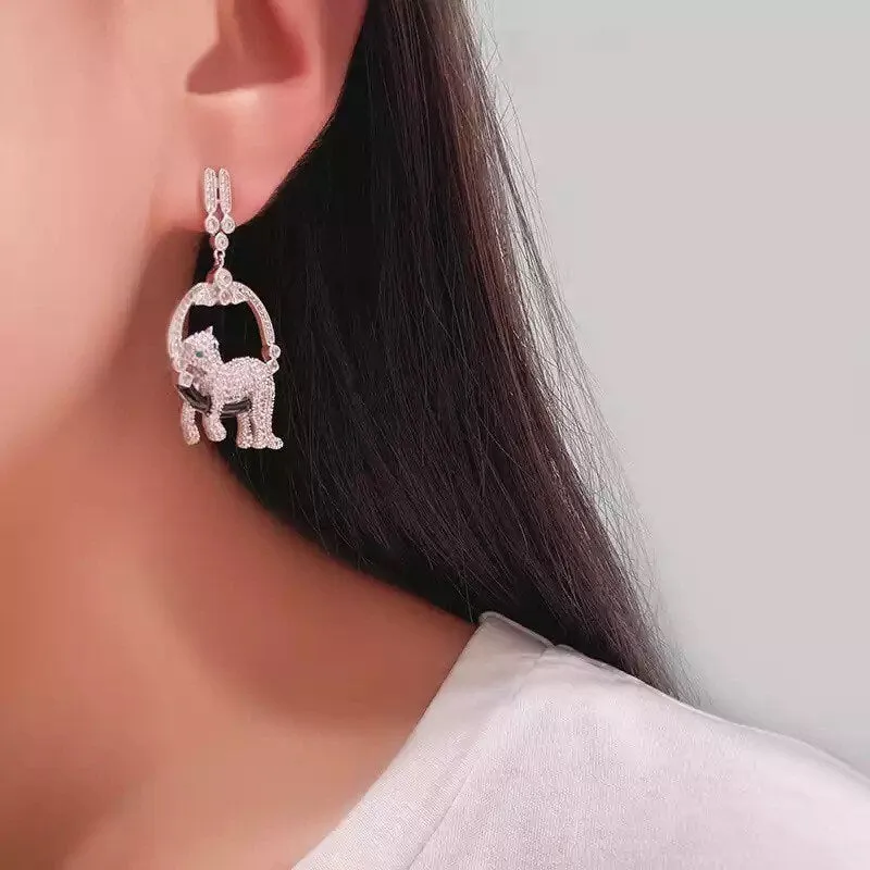 Lounging Leopard Earrings in Silver with Emerald Eyes