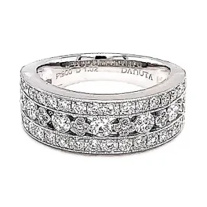 Platinum delicate band set with channel style diamonds